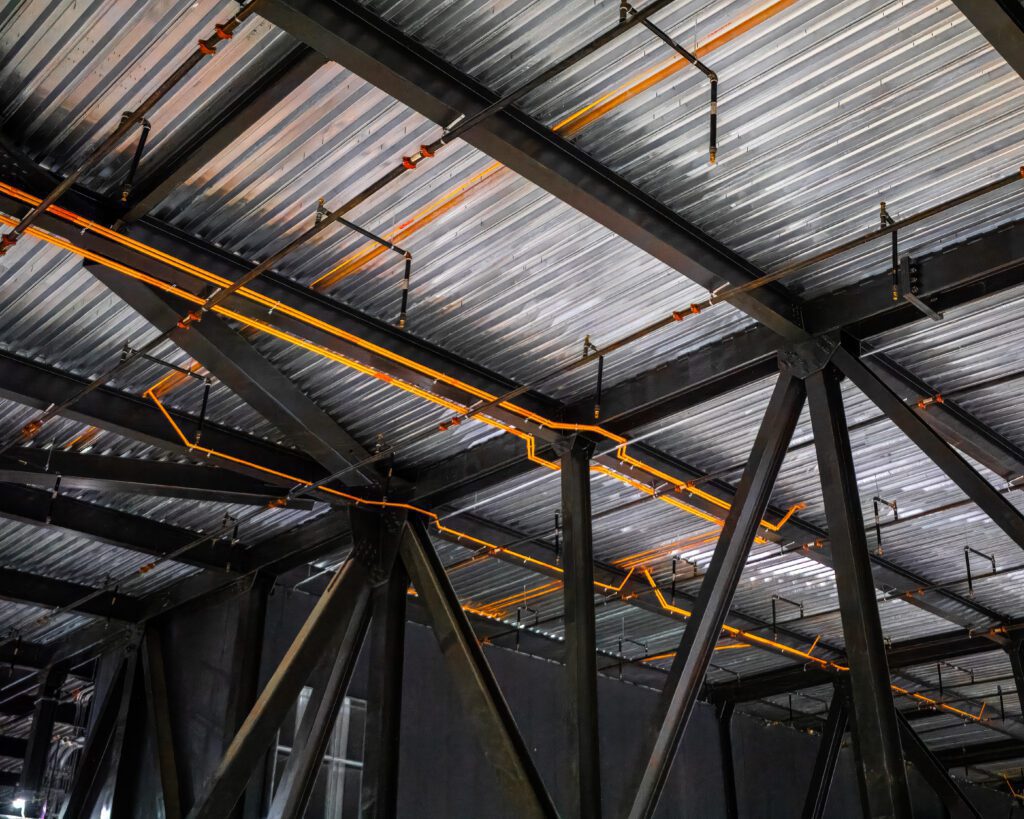 State-of-the-art aspirating smoke detection setup in a professional studio, utilizing Xtralis technology for early warning and fire prevention.